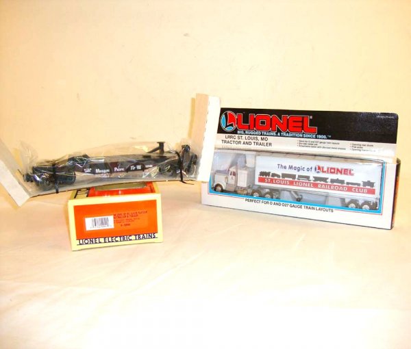 ABT: Mint Lionel #52099 LRRC of St. Louis Flat W/T: Paul V. Ambrose and Drew J. Bauer present: This is the #52099 LRRC of St. Louis Flat with Tractor and Trailer that Lionel made a few years ago. Our Opinion is that it is generally in Mint Condition, n