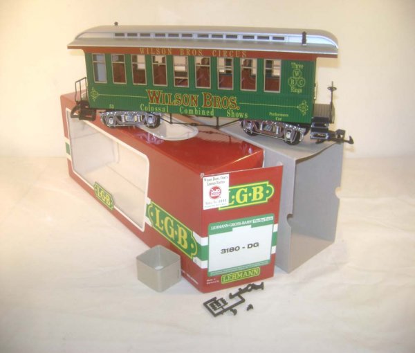 ABT: LGB G Scale #3180-DG Wilson Bros. Coach/OB: Paul V. Ambrose and Drew J. Bauer present: This is the #3180-DG Wilson Bros. Coach that LGB made in G Scale a few years ago. Our Opinion is that it is generally in Like New Condition. The Original Box
