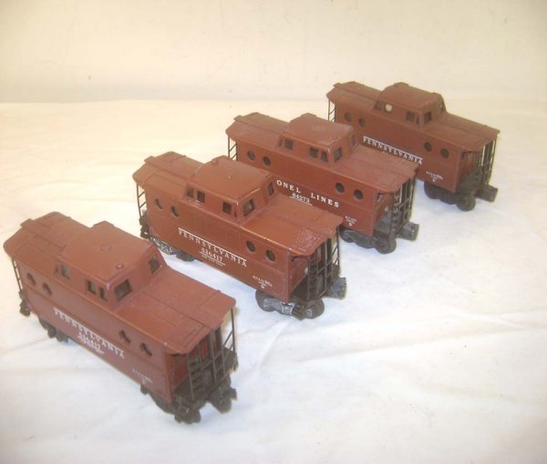 ABT: 3 Lionel #6417 & #6427 Porthole Cabooses: Paul V. Ambrose and Drew J. Bauer present: These are three #6417 Pennsylvania and the #6427 Lionel Lines Porthole Cabooses that Lionel made in the 1950s. Please add $18.00 for US-48 Shipping and Insur