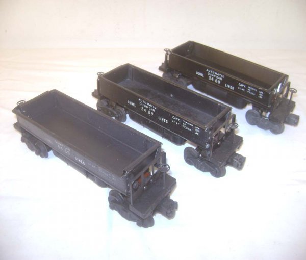 ABT: 3 Lionel #3469 Operating Ore Cars: Paul V. Ambrose and Drew J. Bauer present: These are three #3469 Operating Ore Cars that Lionel made in the late 1940s and early 1950s. Please add $16.00 for US-48 Shipping and Insurance.