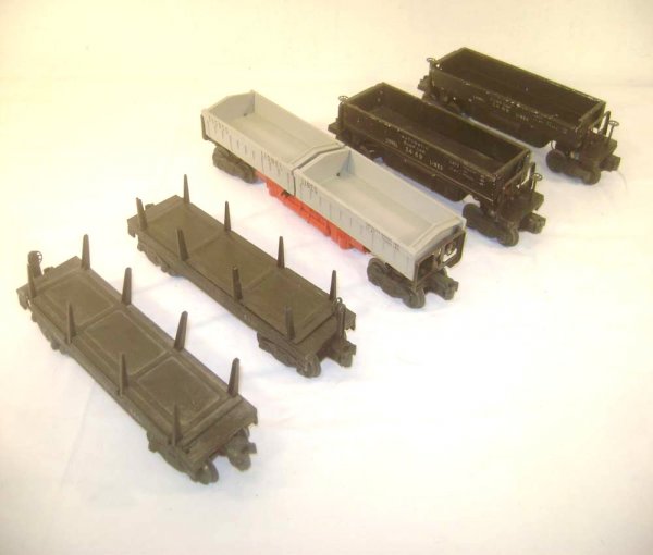 ABT: 5 Lionel Operating Dump Cars: Paul V. Ambrose and Drew J. Bauer present: These are the #3359 Twin Bin and two #3469 Ore Dump Cars, and two #3461 Log Dump Cars that Lionel made in the 1950s. Please add $20.00 for US-48 Shipping and