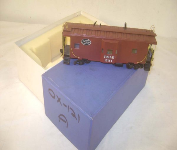 ABT: O-Scale Brass: Pecos River Brass #521 P&LE Ba: Paul V. Ambrose and Drew J. Bauer present: This is the O-scale Brass #521 P&LE Bay Window Caboose that Pecos River Brass made circa the 1990s. Note missing one axle/wheels. Our Opinion is that it is g