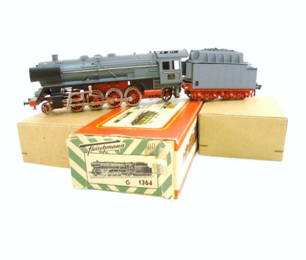 ABT: Fleischmann HO #1364 Engine & Tender/OB: Paul V. Ambrose and Drew J. Bauer present: These are the Grey #1364 2-8-0 Steam Engine and Tender that Fleischmann made in HO circa the 1950s. Our Opinion is that they are generally in Like New Condit
