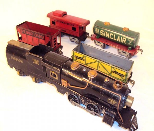ABT: 6 American Flyer O Steam Engine, Tender and A: Paul V. Ambrose and Drew J. Bauer present: These are the Engine, Tender and #1228/311267/31131/1127 Assorted Cars that American Flyer made circa the 1930s. Please add $20.00 for US-48 Shipping and Ins