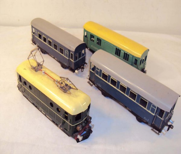 ABT: Nice 4-Unit MAV Hungarian State Railway Passe: Paul V. Ambrose and Drew J. Bauer present: These are the MAV Electric Engine plus two colorful Coaches and a Postal Wagon that were made in O-gauge by an unknown European manufacturer with markings fo