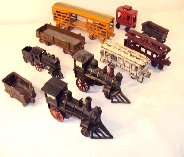 ABT: 10-item Assortment Cast-Iron Floor-Trains: Paul V. Ambrose and Drew J. Bauer present: This is a 10-item assortment of cast-iron Floor Trains of unknown age and made by unknown Manufactureres. Examine the pictuires carefully. What you see is wh