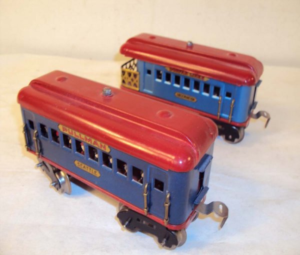 ABT: 2 Dorfan Passenger Cars (R): Paul V. Ambrose and Drew J. Bauer present: These are two Passenger Cars that Dorfan made in O Gauge circa the 1930s. Repainted. Note silhouettes in the Seattle Pullman. Please add $14.00 for US-48 Shi