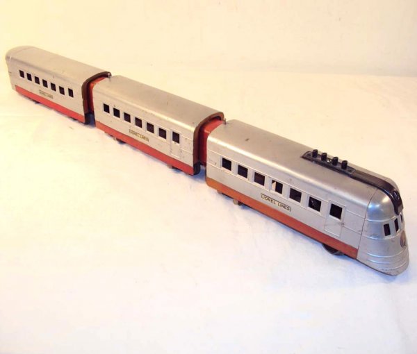 ABT: Lionel #1700/1701/1702 Streamliner Set - Smoo: Paul V. Ambrose and Drew J. Bauer present: These are the #1700, #1701 and #1702 Red/Silver Streamline Set that Lionel made in O Gauge in the mid-1930s. Scarce Smooth Sided Variation. Please add $18.00