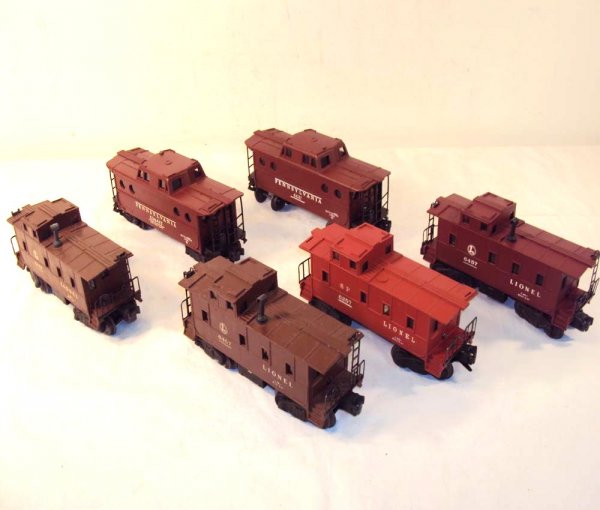 ABT: 6 Assorted Lionel Cabooses: Paul V. Ambrose and Drew J. Bauer present: These are six assorted Cabooses that Lionel made Post War. Included are Porthole models #6417 and #6437, three Premium SP-type #6457 examples, and #6257 with