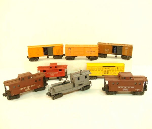 ABT: 8 Assorted Lionel Freight Cars and Cabooses: Paul V. Ambrose and Drew J. Bauer present: These are eight assorted Freight Cars and Cabooses that Lionel made in the 1940s and 1950s. Examine the pictures accordingly. Please add $25.00 for US-48 Shi