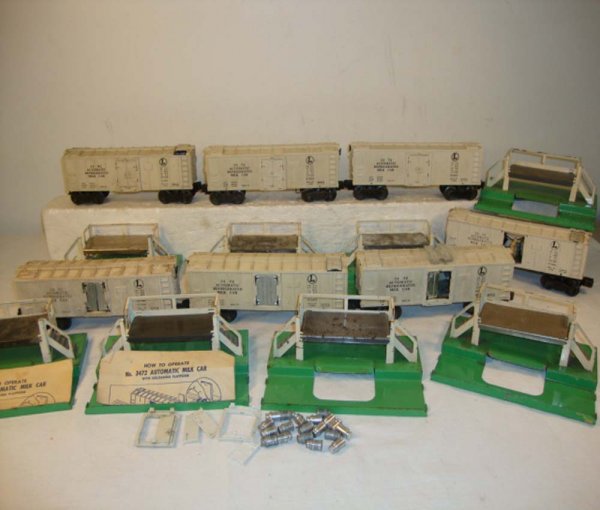 ABT: 7 Lionel Operating Milk Cars & 8 Platforms: Paul V. Ambrose and Drew J. Bauer present: These are two #3462, four #3472, and one #3482 Operating Milk Cars and eight Platforms that Lionel made in the late 1940s and 1950s. Please add $25.00 for US