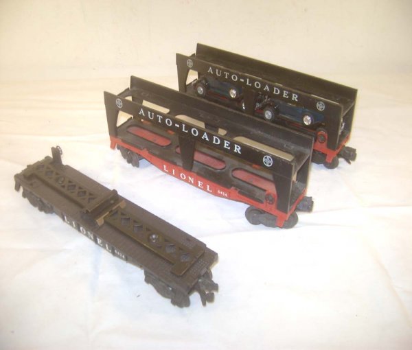 ABT: 2 Lionel #6414 & 6424 Auto Loaders: Paul V. Ambrose and Drew J. Bauer present: These are two Red #6414 and the Black #6424 Auto Loaders that Lionel made in the middle 1950s. Please add $18.00 for US-48 Shipping and Insurance.