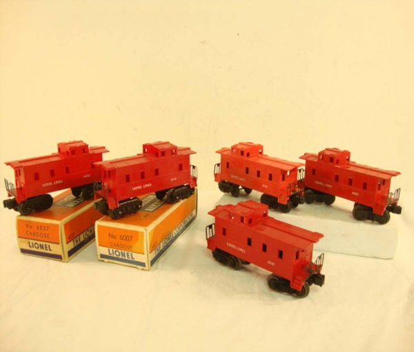 ABT: Nice Lionel 5-Item Assortment SP-Type Caboose: Paul V. Ambrose and Drew J. Bauer present: These are the #6007, the scarce Red #6037, the Lt. Cherry #6047, and two #6057 SP-type Cabooses that Lionel made Post War. Note that one of the #6057 models 