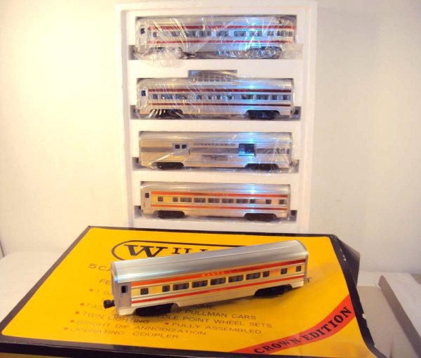 ABT: Mint Williams Santa Fe Streamline Red-Stripes: Paul V. Ambrose and Drew J. Bauer present: These is the Santa Fe Streamline Red-Stripes Passenger Cars that Williams made in O Gauge several years ago. Our Opinion is that they are generally in Mint C