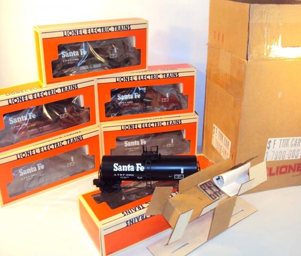 ABT: Mint Case of 6 Lionel #17900 Santa Fe Uni-Bod: Paul V. Ambrose and Drew J. Bauer present: These are a case of #17900 Santa Fe Uni-Body Tank Cars (6 cars) that Lionel made a few years ago. Our Opinion is that they are generally in Mint Condition, n
