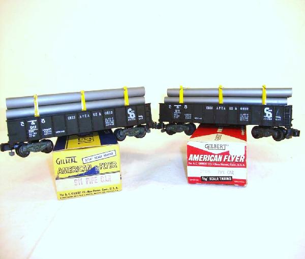 ABT: 2 AF S: #911 Chesapeake & Ohio Pipe Cars/OBs: Paul V. Ambrose and Drew J. Bauer present: These are two #911 Chesapeake and Ohio Pipe Cars that American Flyer made in S Gauge a few years ago. Our Opinion is that they are generally in Excellent Con