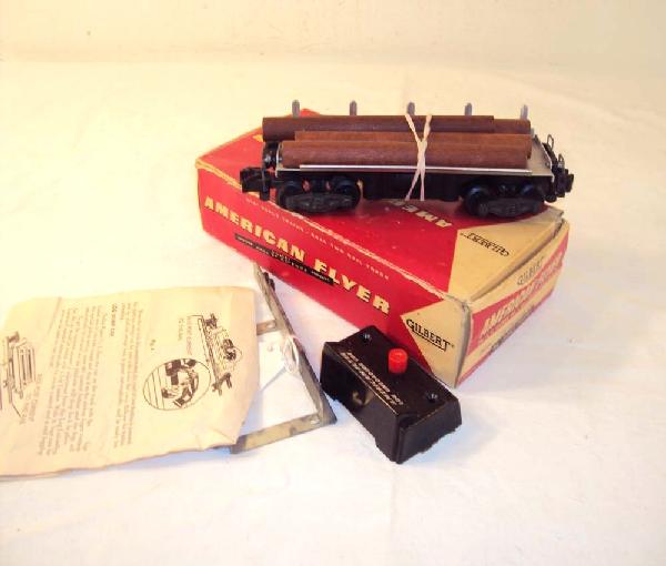 ABT: AF S: #25004 (914) Operating Log Car/OB: Paul V. Ambrose and Drew J. Bauer present: This is the #(914) Operating Log Car that American Flyer made in S Gauge in the late 1950s. Our Opinion is that it is generally in Excellent Minus Condition.