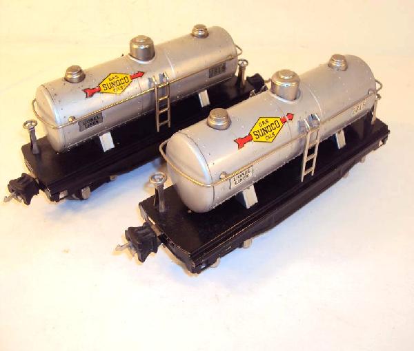 ABT: 2 Lionel #2815 Silver Sunoco Tank Cars: Paul V. Ambrose and Drew J. Bauer present: These are two #2815 Silver Sunoco Tank Cars that Lionel made in the later 1930s in O-Gauge. Our Opinion is that they are generally in Very Good Plus Conditio