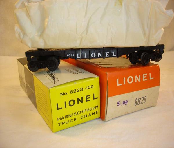 ABT:Mint Lionel #6828 P&H Crane/Dark/66c OB: This is the #6828 Black Flat Car with P&H Crane that Lionel made around 1966. Our Opinion is that it is generally in Mint Condition, no signs of use, the Crane is still unwrapped in its Cloth Wrapping
