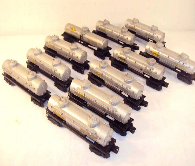ABT: 11 Assorted #2464/6465/6555 Tank Cars: Paul V. Ambrose and Drew J. Bauer present: This is a group of eleven #2465/6465/6555 Tank Cars that Lionel made in the late 1940s and 1950s. Our Opinion is that they average Very Good Condition. No Bo