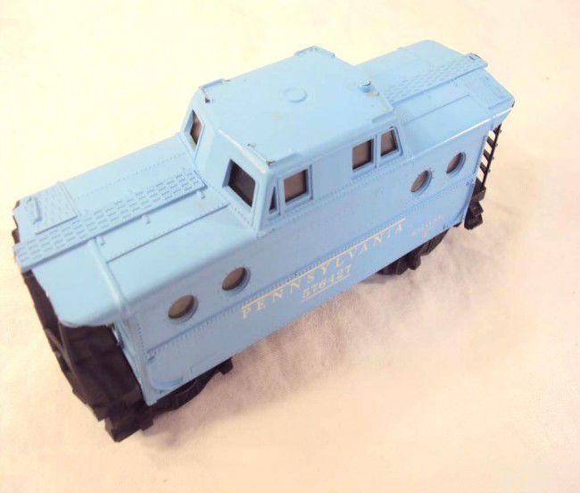 ABT: Lionel #6427-500 Girl's N5C Caboose: Paul V. Ambrose and Drew J. Bauer present: This is the #6427-500 Illuminated Pennsylvania N5C Caboose that Lionel made in 1957/58 for inclusion in the notable Girl's Set #1587S. Our Opinion is that it
