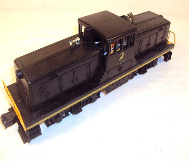 ABT: Lionel #628 Northern Pacific Center-Cab Switc: Paul V. Ambrose and Drew J. Bauer present: This is the #628 Northern Pacific Center-Cab Diesel Switcher that Lionel made in the later 1950s. Our Opinion is that it is generally in Very Good Condition.