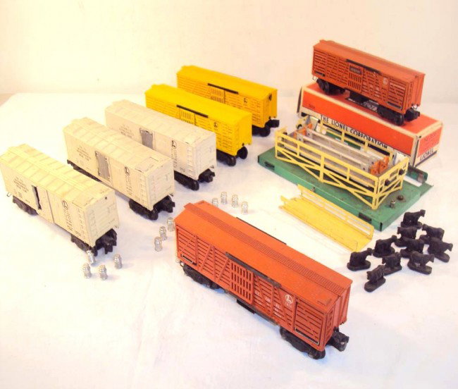 ABT: 7 Lionel Milk/Refrigerator/Cattle Cars: Paul V. Ambrose and Drew J. Bauer present: These are seven Freight Cars that Lionel made in the 1940s/50s. Included are the #3462 Operating Milk Car, two #3472 Operating Milk Cars, two #6656 Cattle Ca