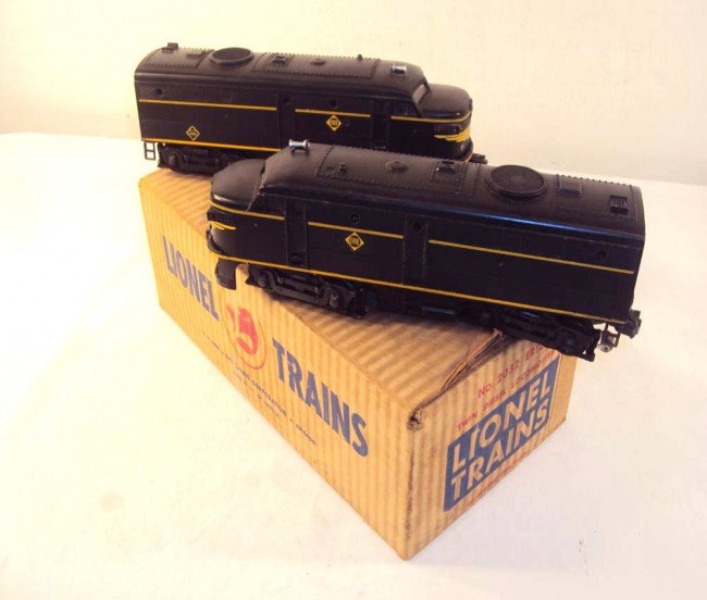 ABT: Lionel #2032 Erie Alco AA Diesels/OB+: Paul V. Ambrose and Drew J. Bauer present: These are the #2032 Erie Alco AA Diesels with Magnetraction and Horn that Lionel made circa 1953. Our Opinion is that they are generally in Excellent Conditi
