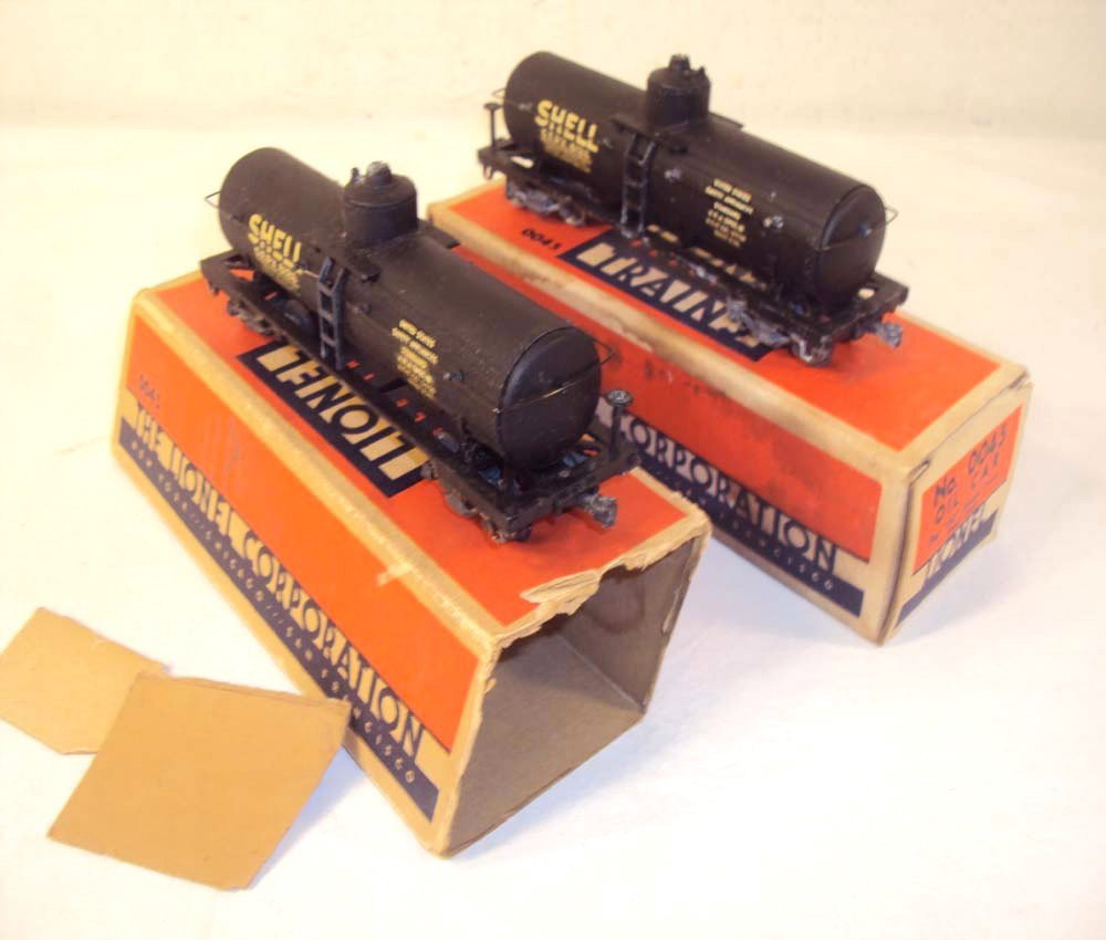 ABT: 2 Lionel OO Gauge #0045 Shell Oil Cars/OBs: Paul V. Ambrose and Drew J. Bauer present: These are two #0045 two-rail Shell Oil cars that Lionel made OO-gauge circa 1940. Our Opinion is that they are generally in Excellent Plus Condition; great D