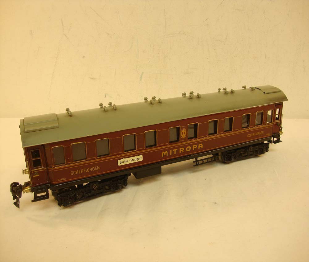 ABT: Marklin O Gauge #19420 Mitropa Sleeping Coach: Paul V. Ambrose and Drew J. Bauer present: This is the #19430 Mitropa Sleeper that Marklin made in O gauge during the Pre War Era. This example measures approx. 16-inches in length. Our Opinion is tha