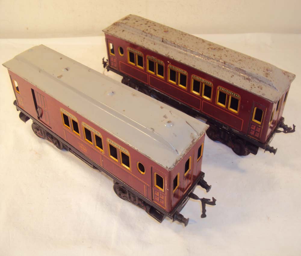 ABT: 2 Bing 1 Gauge #1250-series Passenger Cars: Paul V. Ambrose and Drew J. Bauer present: These are two #1250-series Passenger Cars that Bing made in 1 gauge circa 1930. Our Opinion is that they are generally in Fair and Good Condition respectivel