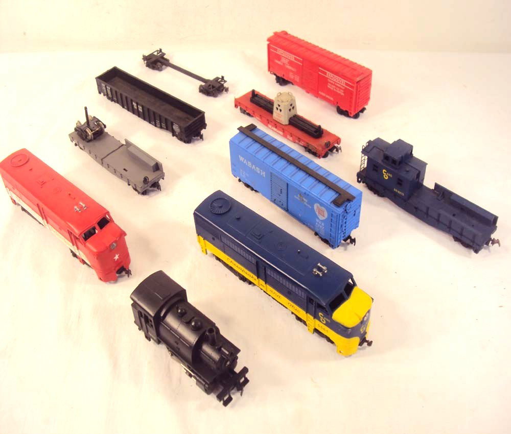ABT: 9 Assorted HO Lionel Engines & Rolling Stock: Paul V. Ambrose and Drew J. Bauer present: These are nine Assorted Engines and Rolling Stock that Lionel made in HO gauges. No Boxes. Please add $16.00 for US-48 Shipping and Insurance.