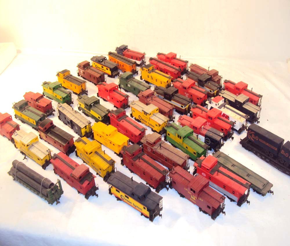 ABT: 39 Assorted HO Cabooses and 3 Flat Cars: Paul V. Ambrose and Drew J. Bauer present: These are thirty-nine Assorted Cabooses and three Flat Cars that were made in HO some years ago. Please look at pictures. No Boxes. Please add $20.00 for US-