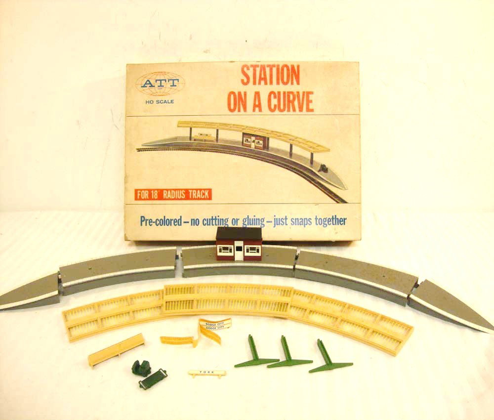ABT: ATT HO #612-498 Station-on-a- Curve/OB: Paul V. Ambrose and Drew J. Bauer present: This is the #612-498 Station-on-a-Curve that ATT made in HO some time ago. Includes OB as shown. Please add $12.00 for US-48 Shipping and Insurance.