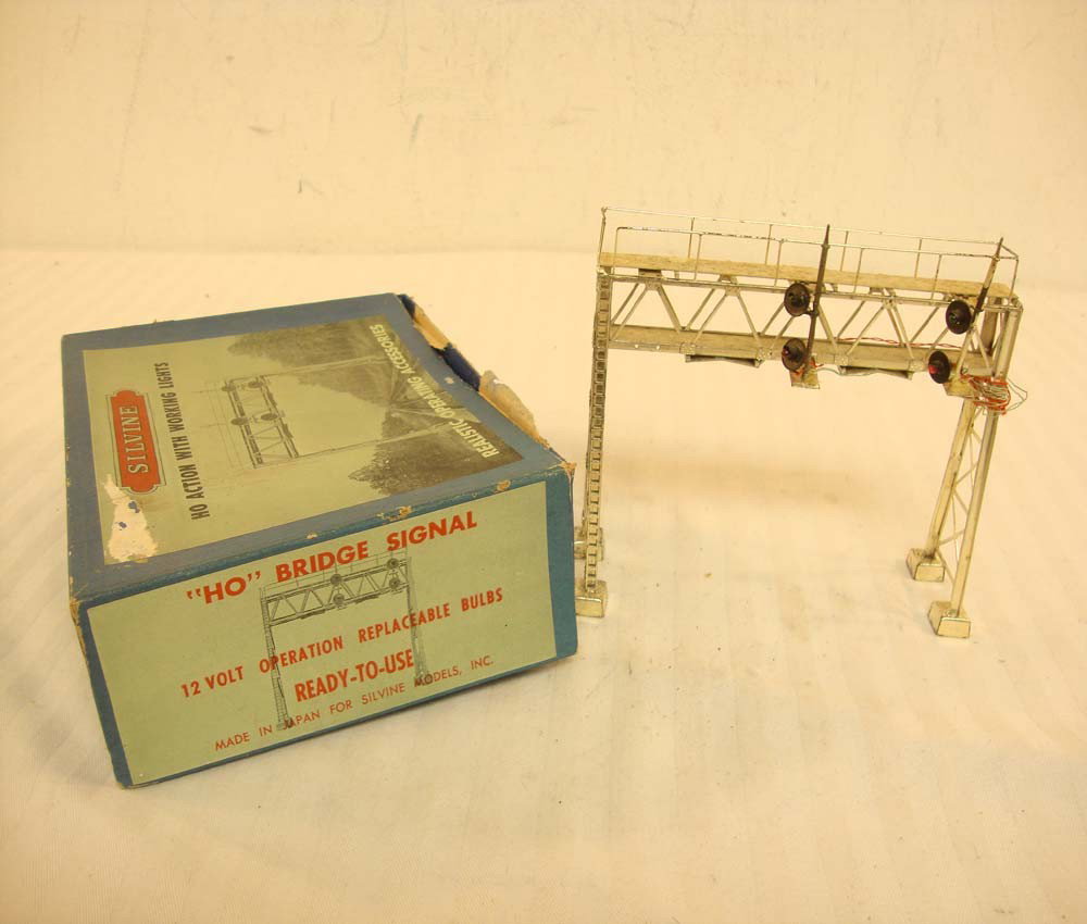 ABT: Rare Silvine HO Lighted Bridge Signal/OB: Paul V. Ambrose and Drew J. Bauer present: This is the rare Bridge Signal w/12 volt working lights that Silvine made in Japan in HO some time ago. Includes OB as pictured. Please add $12.00 for US-48 