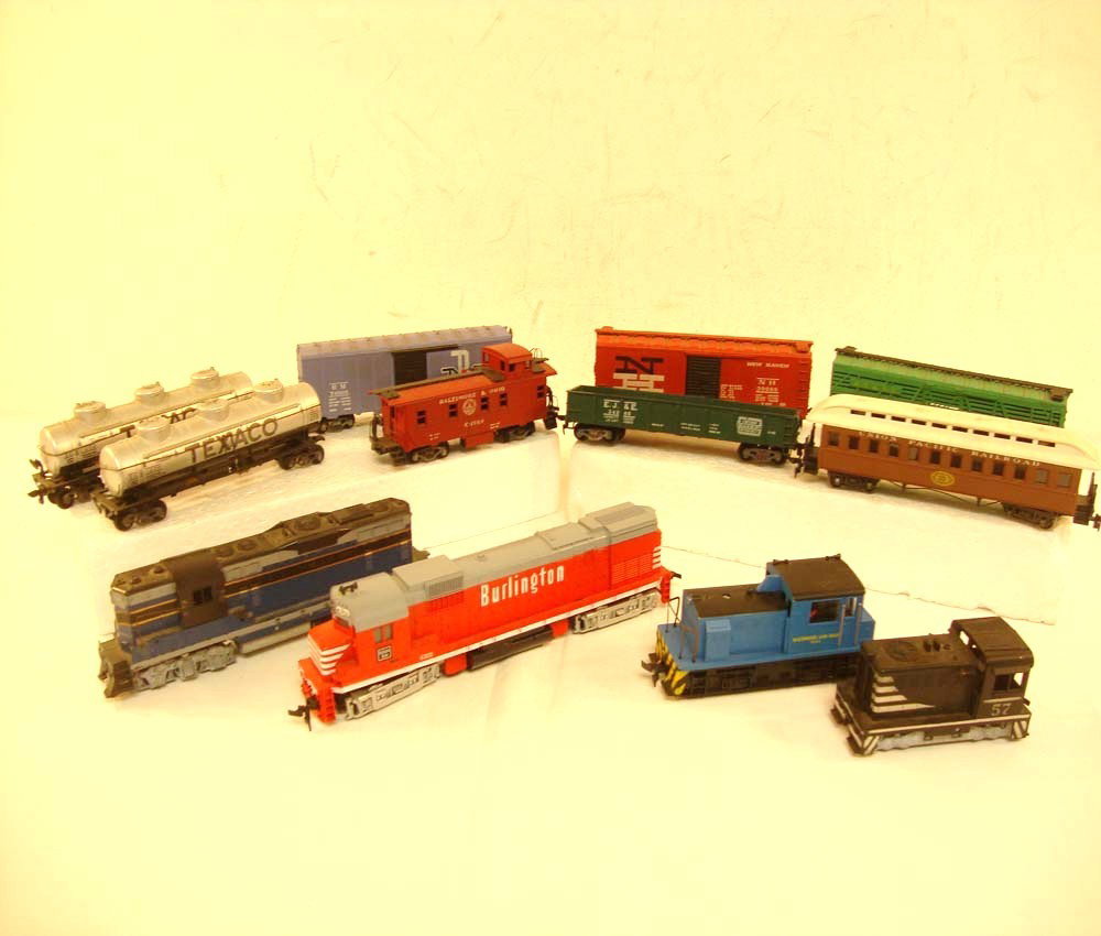 ABT: 12 Assorted HO Gauge Cars/Engines: Paul V. Ambrose and Drew J. Bauer present: These are twelve Assorted items (2 Engines) in HO Gauge from various Makers a few years ago. What is pictured is what you will receive. No Boxes. Please add 