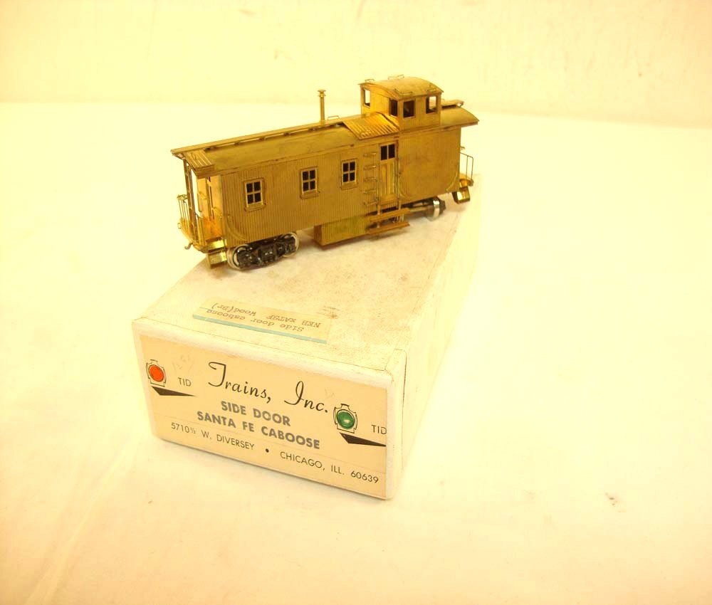 ABT: Trains Inc. HO Brass Santa Fe Side-Door Caboo: Paul V. Ambrose and Drew J. Bauer present: This is the HO Brass Santa Fe side-door Caboose that Trains Inc. made circa 1966. Includes nice OB. Please add $16.00 for US-48 Shipping and Insurance.