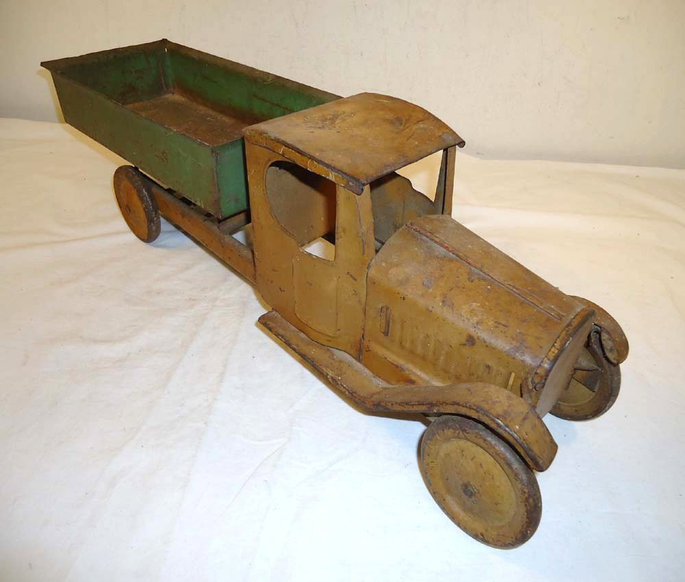 ABT: Large Vintage Dump Truck: Paul V. Ambrose and Drew J. Bauer present: This is a great Vintage Dump Truck from an unknown Maker of many years ago. This example measures 23' long x 6' wide x 7' high. Examine the pictures carefull