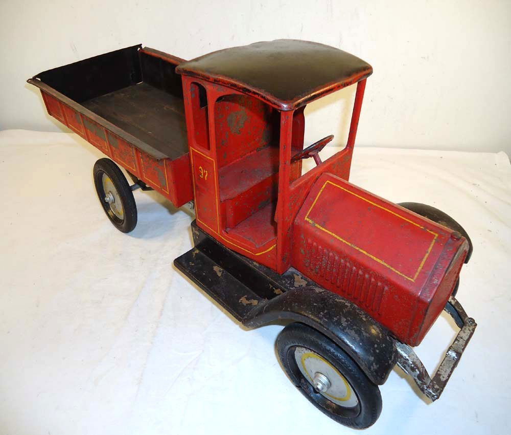 ABT: Large Vintage #97 Sturditoy Pick-up Truck: Paul V. Ambrose and Drew J. Bauer present: This is a large Vintage #97 Pick-up Truck made by Sturditoy many years ago. The vehicle measures 27' Long x 8 1/2' wide x 11' high. Examine the pictures care