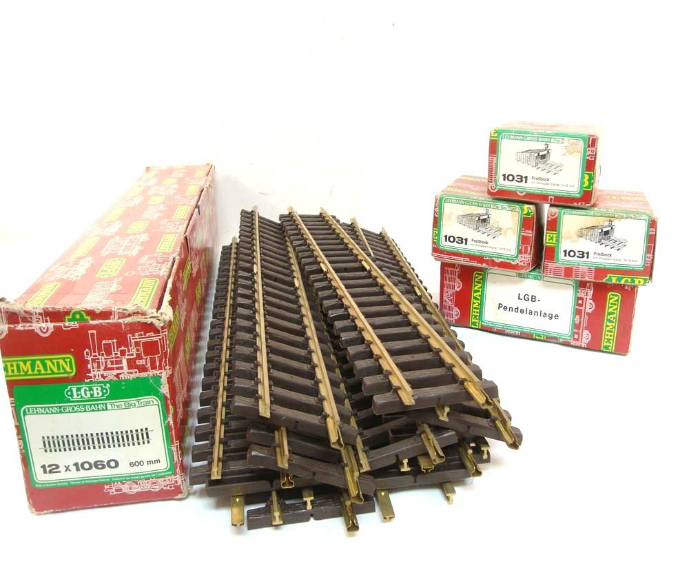 ABT: LGB Track and Accessories/OB: Paul V. Ambrose and Drew J. Bauer present: These are #1060 Track, three #1031 Bumpers, and Bumper with Attachments that LGB made a few years ago. Some Original Boxes, one incorrect. Please add $18.00 