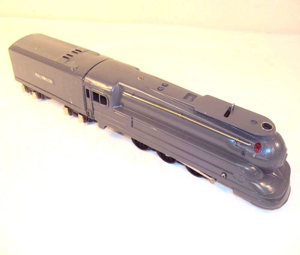 ABT: Lionel #1668 Engine & Tender (R): Paul V. Ambrose and Drew J. Bauer present: These are the #1668 Steam Engine and Tender that Lionel made Pre War. Repainted and Engine missing one side-plate. No Boxes. Please add $16.00 for US-48 Ship