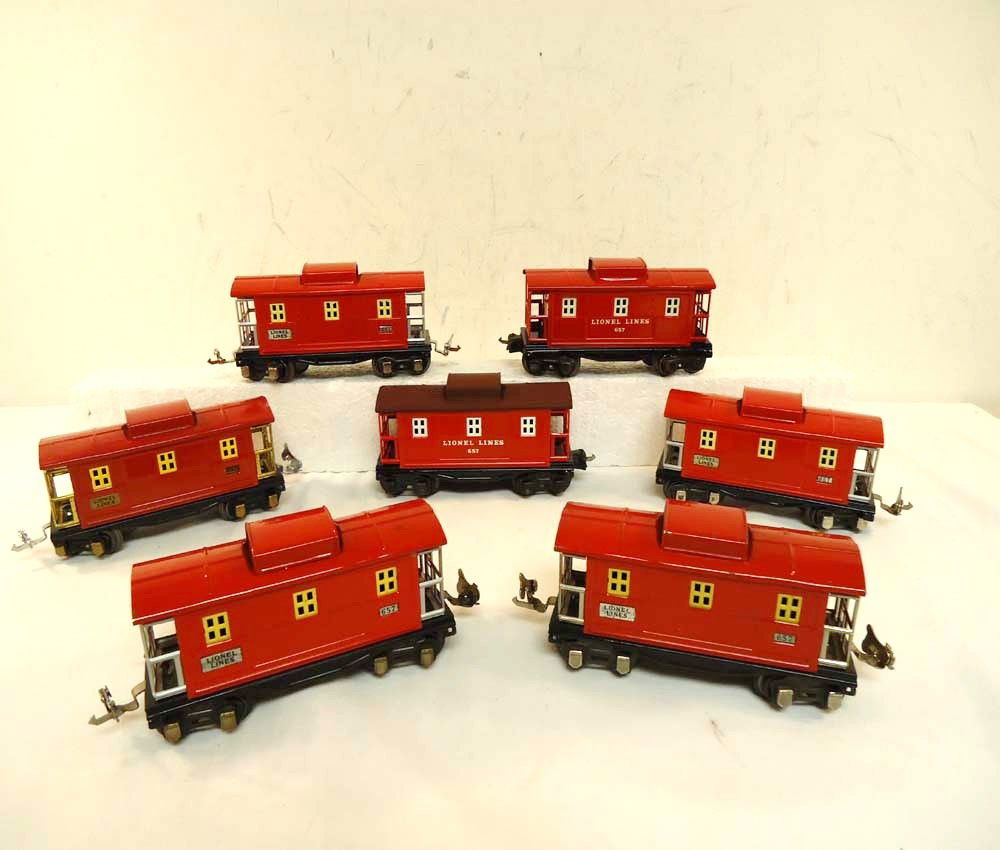 ABT: 7 Lionel #657 Cabooses (R): Paul V. Ambrose and Drew J. Bauer present: These are seven #657 Cabooses that Lionel made Pre War. Most are repainted and no Boxes. Please add $20.00 for US-48 Shipping and Insurance.