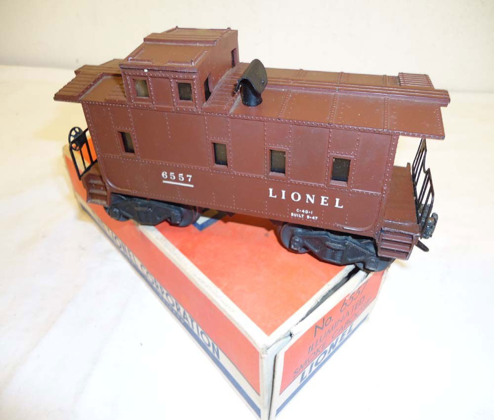ABT: Lionel #6557 Smoke Caboose/OB: Paul V. Ambrose and Drew J. Bauer present: This is the #6557 Smoke Caboose that Lionel made in the later 1950s. Includes OB as pictured. Please add $14.00 for US-48 Shipping and Insurance.