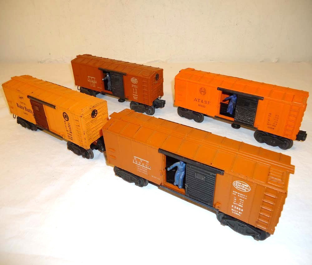 ABT: Lionel #2454 & #3464 (3) Operating Box Cars: Paul V. Ambrose and Drew J. Bauer present: These are the #2454 Baby Ruth and three #3464 Operating Box Cars that Lionel made in the late 1940s. No Boxes. Please add $18.00 for US-48 Shipping and Insur