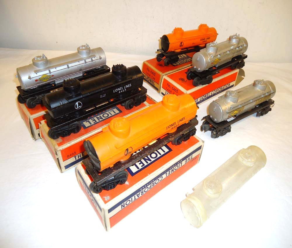 ABT: 6 Assorted #2465/6465 Tank Cars & Clear Body/: Paul V. Ambrose and Drew J. Bauer present: These are six assorted #2465/6465 Tank Cars plus a clear body that Lionel made Post. What you see is what you will receive; includes OBs as pictured. Please 