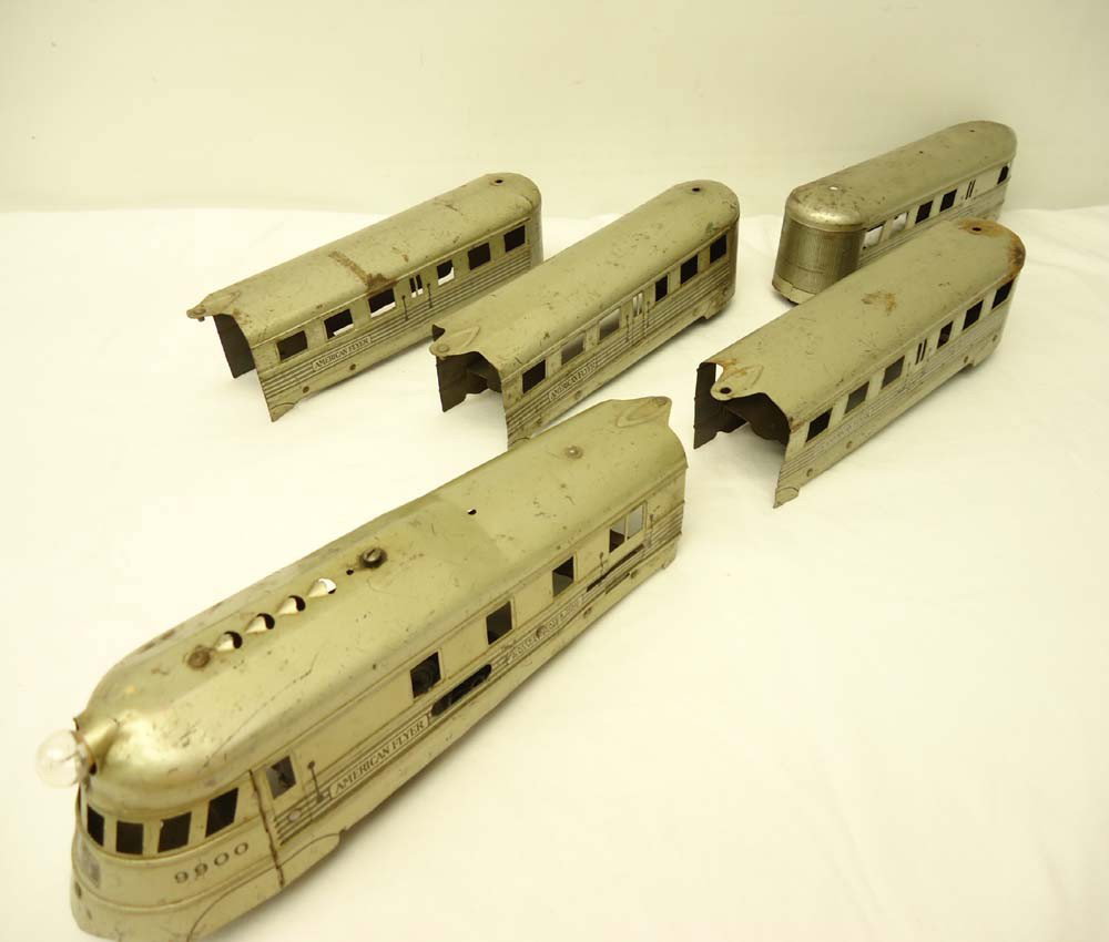 ABT: AF #9900 Burlington Zephyr 5 Piece Pressed-Ste: Paul V. Ambrose and Drew J. Bauer present: This is the #9900 5-item Burlington Zephyr Pressed Steel Streamliner that American Flyer made in O gauge Pre War. No Boxes. Please add $20.00 for US-48 Shipp