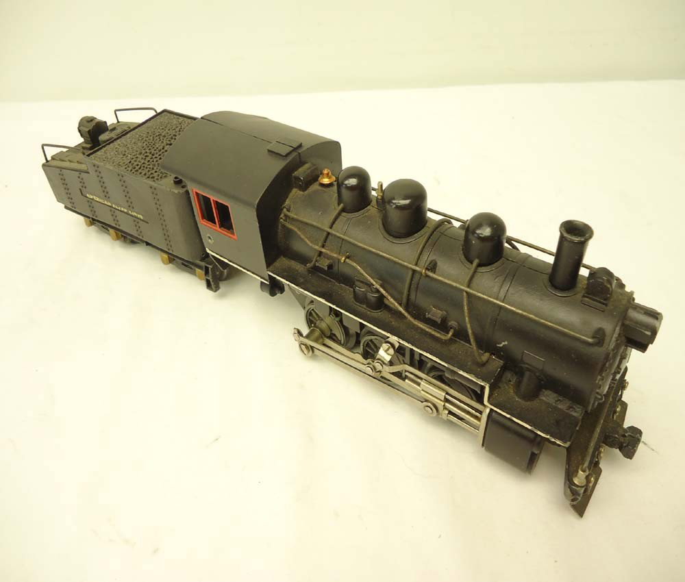 ABT: AF O Gauge 0-6-0 Steam Switcher & Tender (R): Paul V. Ambrose and Drew J. Bauer present: These are the scarce 0-6-0 Steam Switcher and Tender that American Flyer made in O gauge circa 1940. Mostly repainted. No Box. Please add $22.00 for US-48 Sh
