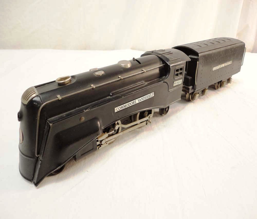ABT: Lionel #265E 'Commodore Vanderbilt' Engine & : Paul V. Ambrose and Drew J. Bauer present: These are the #265E 'Commodore Vanderbilt' Black Steam Engine and Whistle Tender that Lionel made circa the late 1930s. No Boxes and old Repaints. Please add