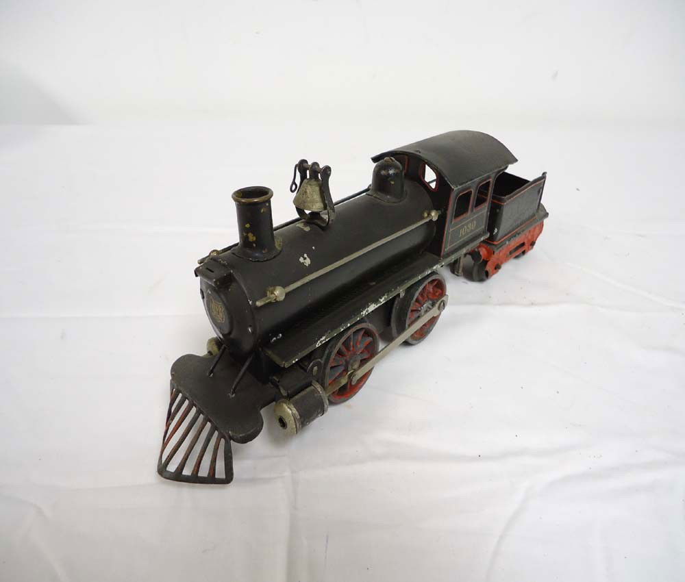 ABT: Marklin O Gauge Clockwork #1030 Steam Engine: Paul V. Ambrose and Drew J. Bauer present: These are the Clockwork #1030 Steam Engine and Tender that Marklin made in O gauge circa the 1920s. No Box. Please add $16.00 for US-48 Shipping and Insuranc