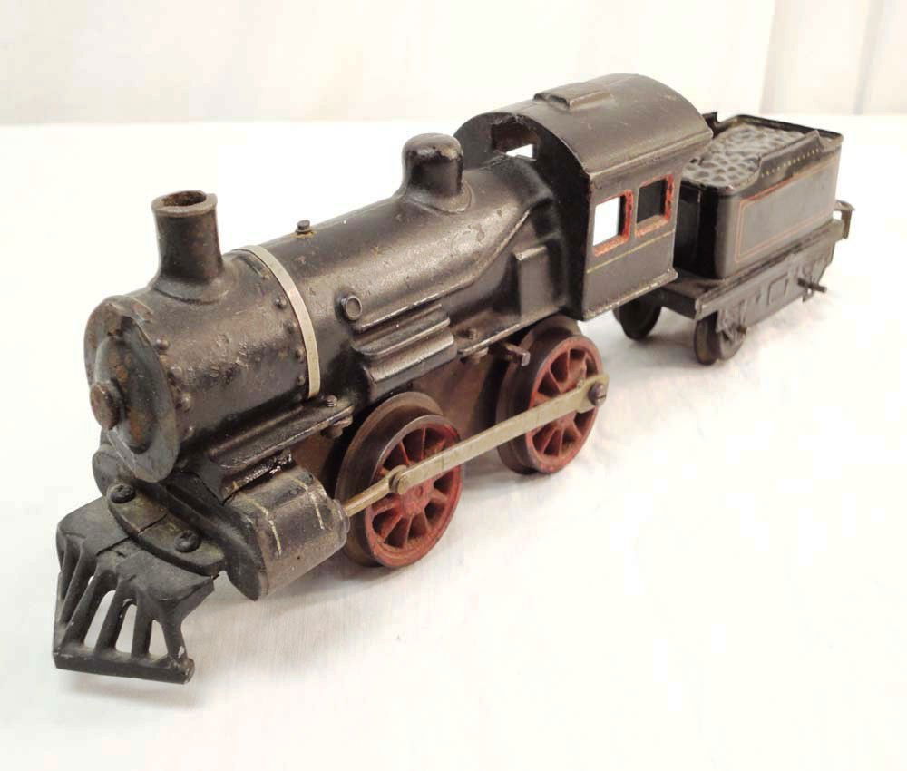 ABT: O Gauge Clockwork Steam Engine & Tender: Paul V. Ambrose and Drew J. Bauer present: This is a die-cast Clockwork Steam Engine and Tender made in O gauge circa 1920. What you see is what you will receive; no Box. Please add $15.00 for US-48 S